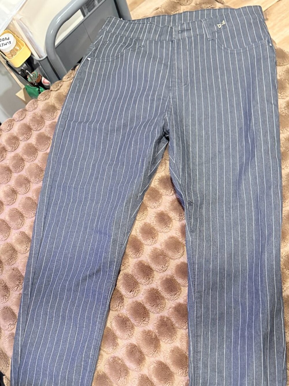 Black, pinstriped pants